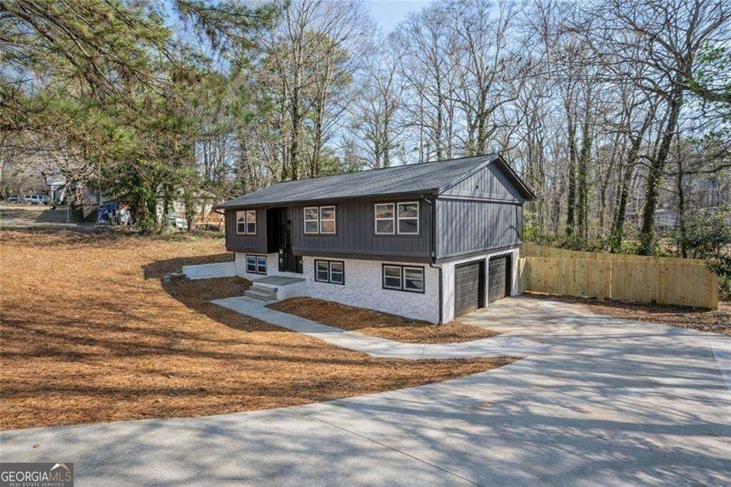 5 bedroom, 3 bathroom, 3,462 sq ft single family residence for sale at 2360 S Hairston Road, Decatur, GA 30035 — photo 2