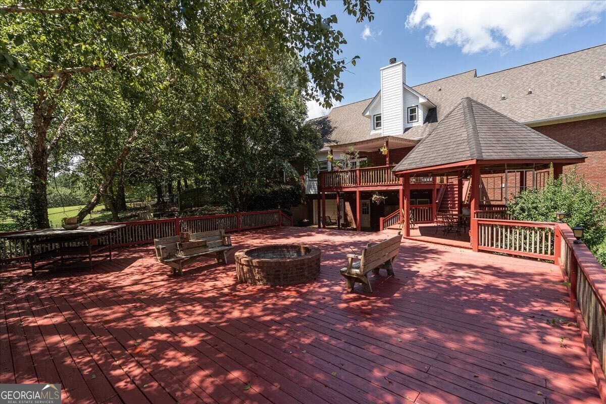 5 bedroom, 3.5 bathroom, 5,879 sq ft single family residence for sale at 2221 Brush Creek Drive, Colbert, GA 30628 — photo 5