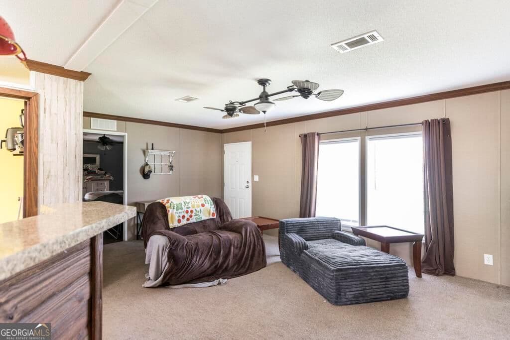 4 bedroom, 2 bathroom, 1,904 sq ft manufactured home,single family residence for sale at 1222 Bowers Cemetery Road, Cochran, GA 31014 — photo 6