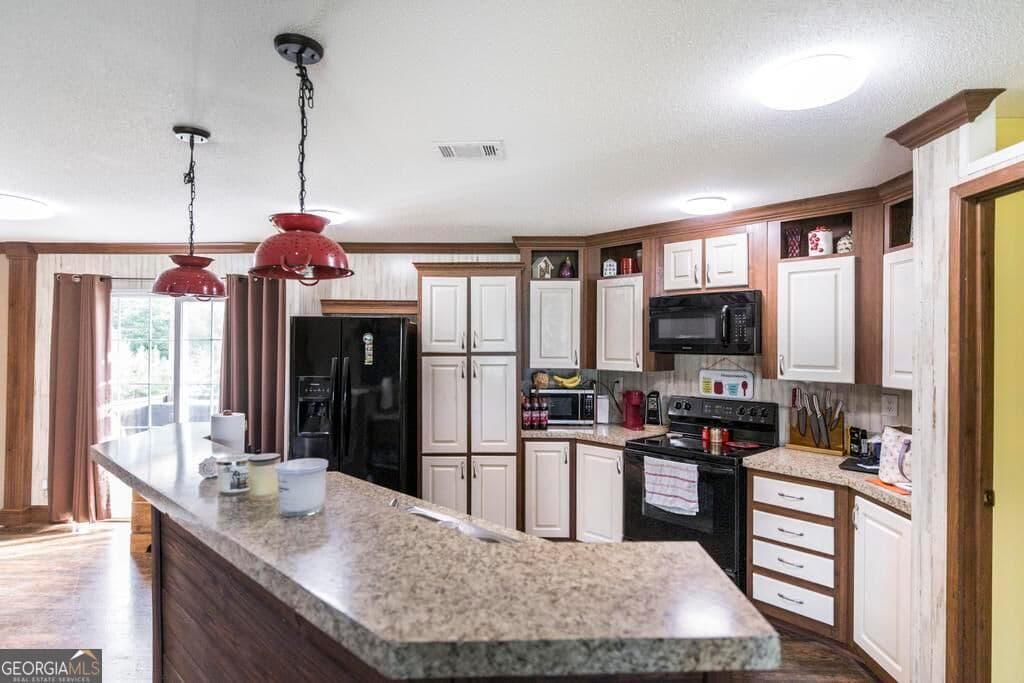 4 bedroom, 2 bathroom, 1,904 sq ft manufactured home,single family residence for sale at 1222 Bowers Cemetery Road, Cochran, GA 31014 — photo 7