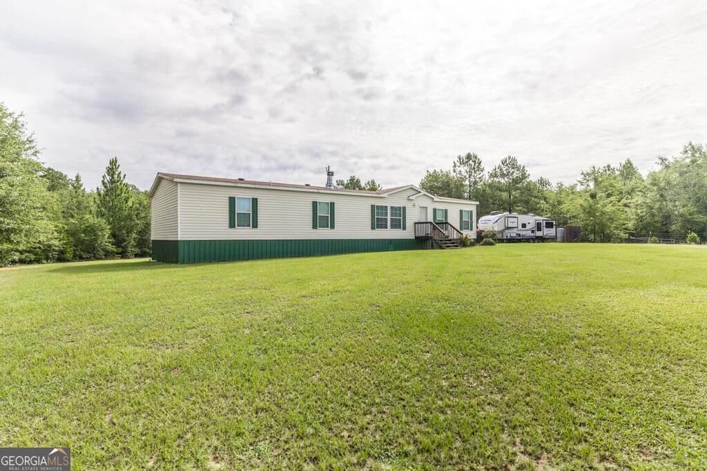 4 bedroom, 2 bathroom, 1,904 sq ft manufactured home,single family residence for sale at 1222 Bowers Cemetery Road, Cochran, GA 31014 — photo 3
