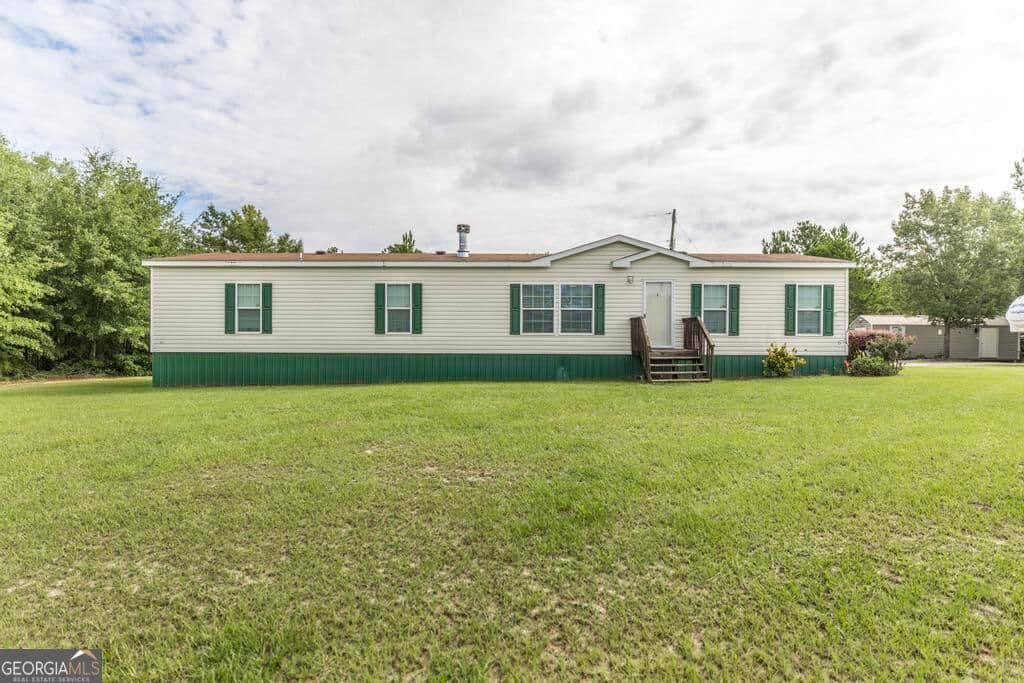 4 bedroom, 2 bathroom, 1,904 sq ft manufactured home,single family residence for sale at 1222 Bowers Cemetery Road, Cochran, GA 31014 — photo 4