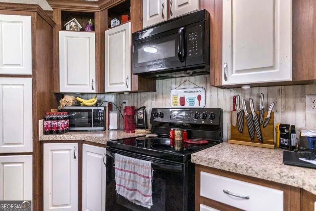 4 bedroom, 2 bathroom, 1,904 sq ft manufactured home,single family residence for sale at 1222 Bowers Cemetery Road, Cochran, GA 31014 — photo 8