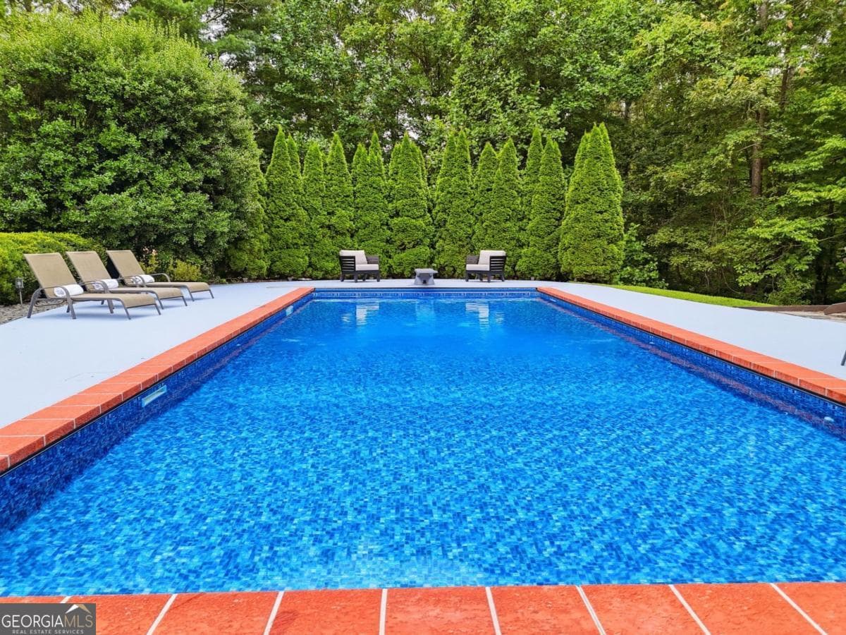 5 bedroom, 4 bathroom, 5,214 sq ft single family residence for sale at 408 Sumner Lane, Ellijay, GA 30540 — photo 8