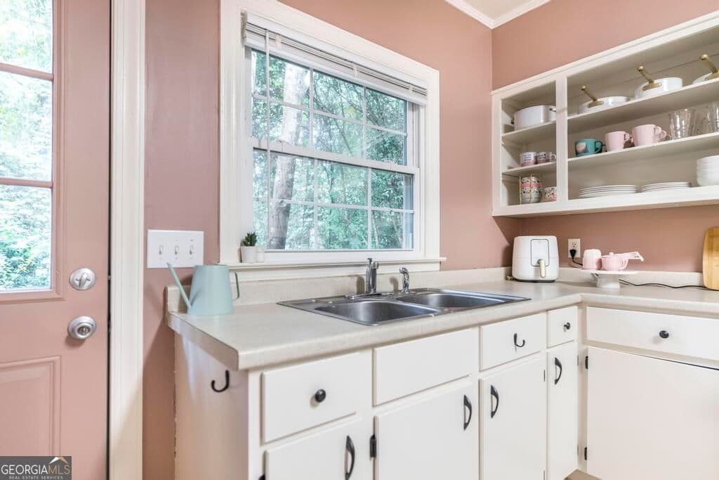 4 bedroom, 1.5 bathroom, 1,457 sq ft single family residence for sale at 460 Sunset Circle, Forsyth, GA 31029 — photo 9