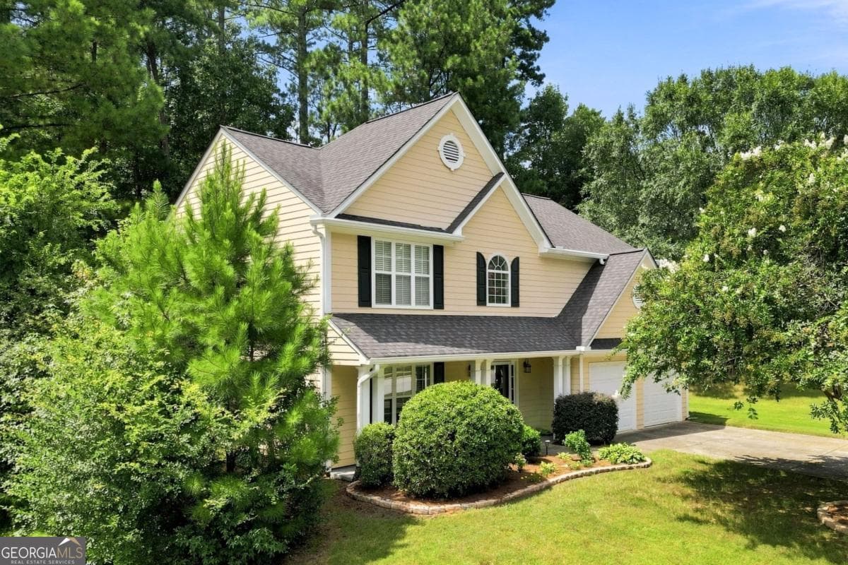 4 bedroom, 2.5 bathroom, 2,286 sq ft single family residence for sale at 1593 Woodmore Drive, Marietta, GA 30008 — photo 2