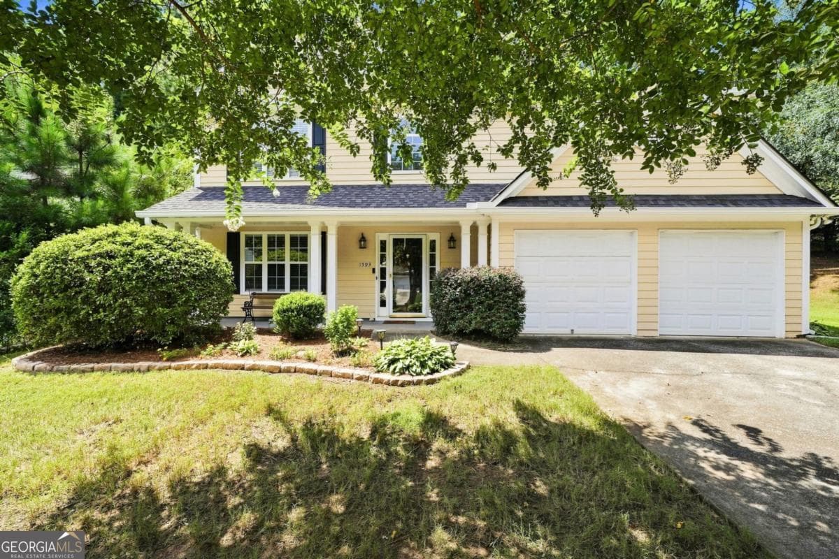 4 bedroom, 2.5 bathroom, 2,286 sq ft single family residence for sale at 1593 Woodmore Drive, Marietta, GA 30008 — photo 4