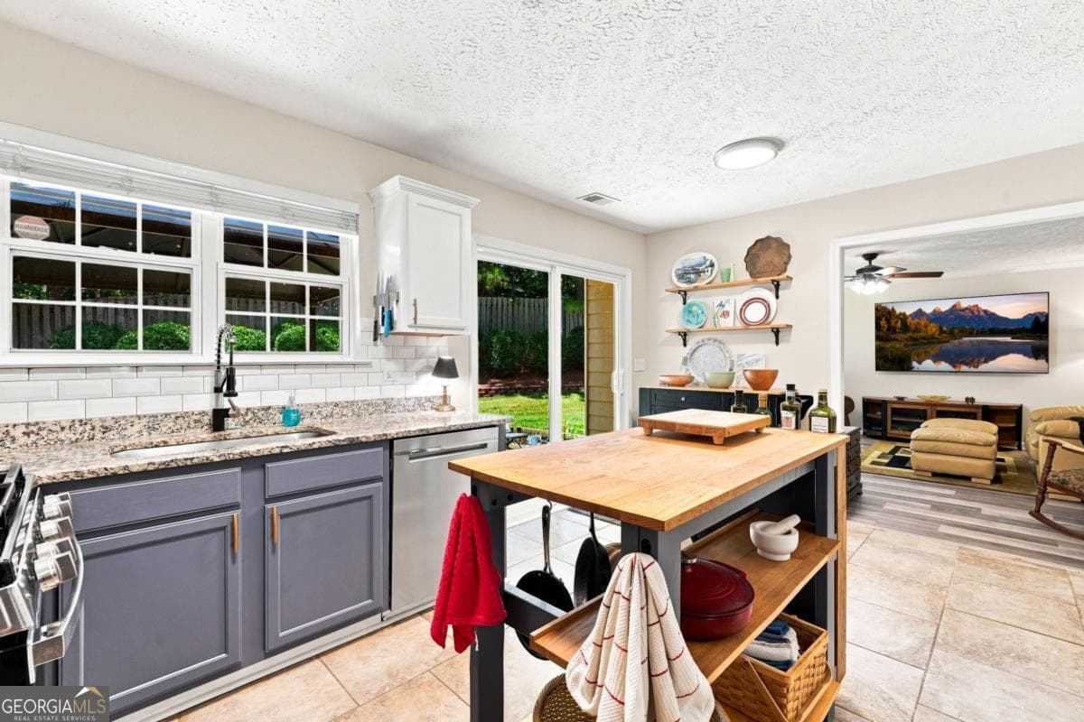 4 bedroom, 2.5 bathroom, 2,286 sq ft single family residence for sale at 1593 Woodmore Drive, Marietta, GA 30008 — photo 8