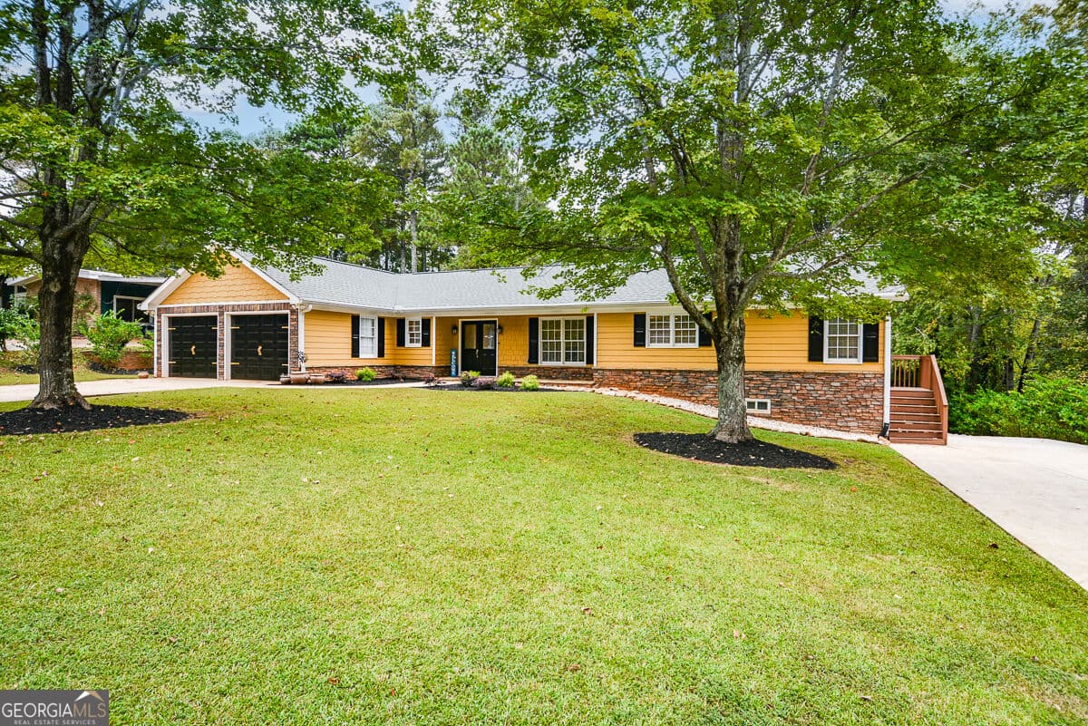 5 bedroom, 4.5 bathroom, 4,849 sq ft single family residence for sale at 2460 Due West Circle, Kennesaw, GA 30152