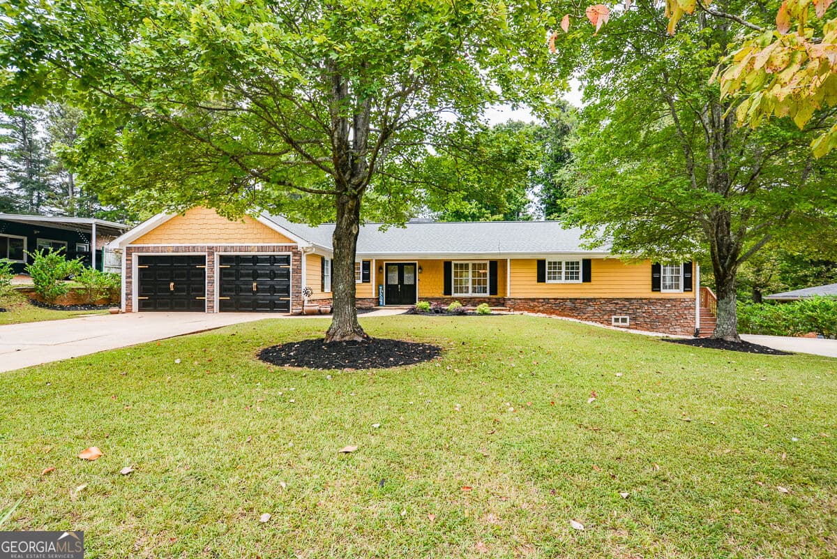 5 bedroom, 4.5 bathroom, 4,849 sq ft single family residence for sale at 2460 Due West Circle, Kennesaw, GA 30152 — photo 8