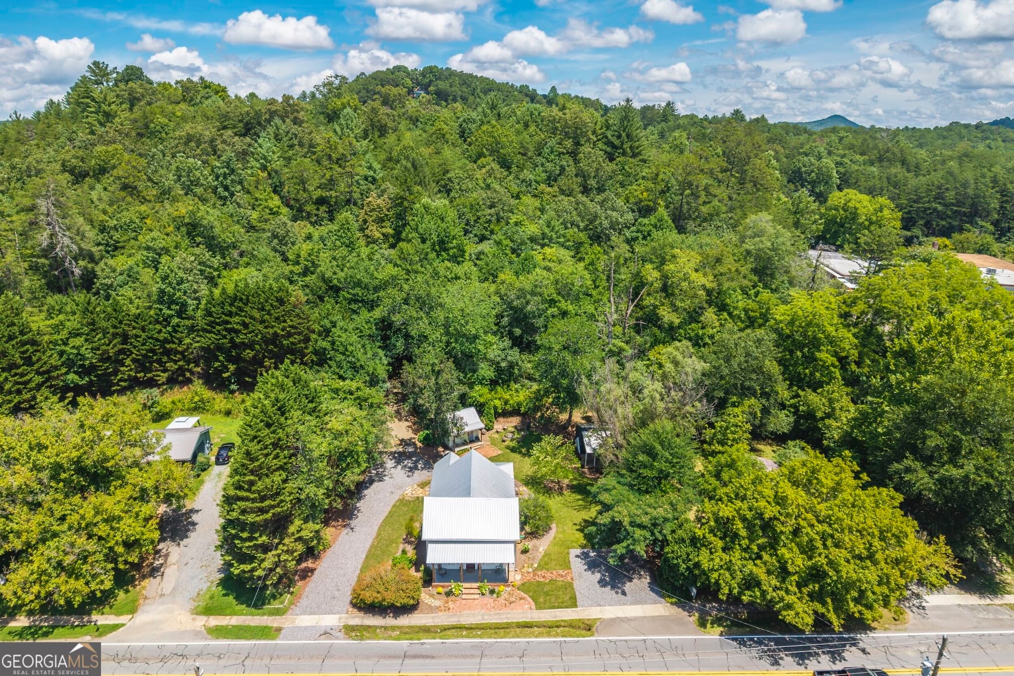 2 bedroom, 1.5 bathroom, 1,487 sq ft single family residence for sale at 8679 Lakewood Highway, Mineral Bluff, GA 30559 — photo 2