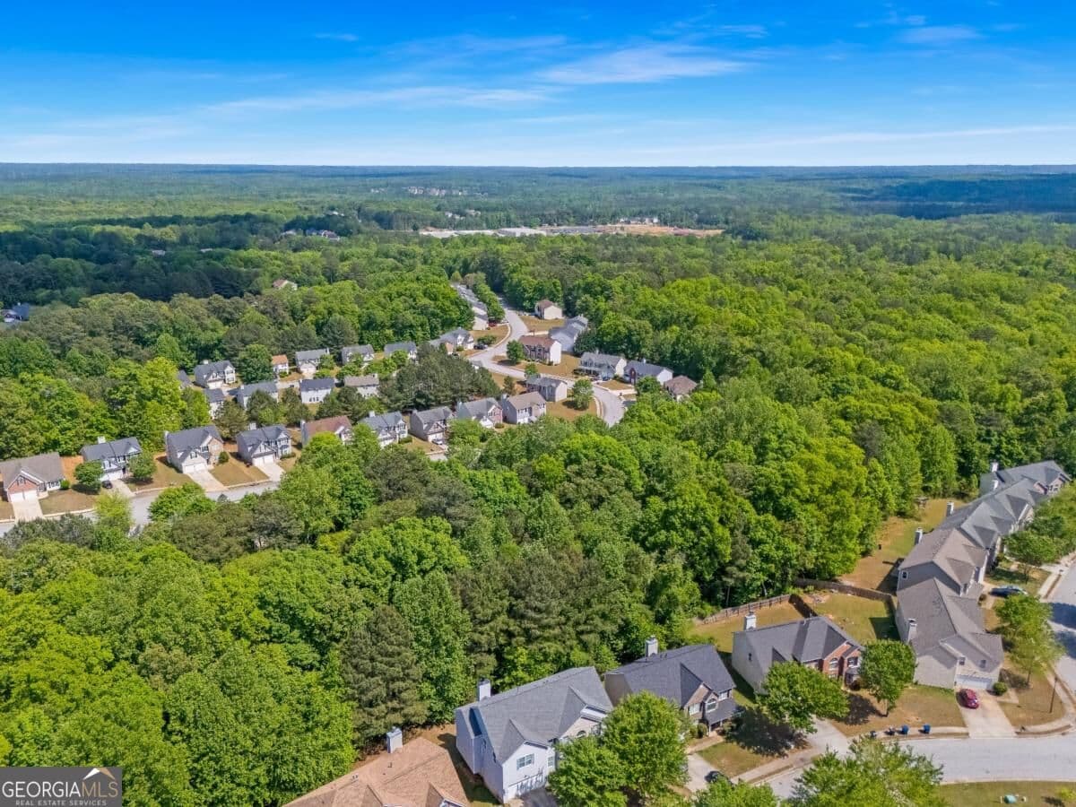 5 bedroom, 3 bathroom, 3,434 sq ft single family residence for sale at 3275 Hunting Creek Pass, Douglasville, GA 30135 — photo 3