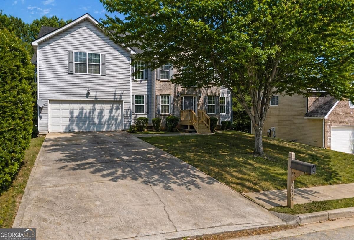 5 bedroom, 3 bathroom, 3,434 sq ft single family residence for sale at 3275 Hunting Creek Pass, Douglasville, GA 30135 — photo 1 of 29