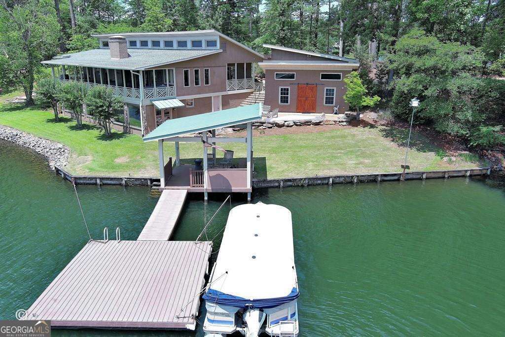 4 bedroom, 3.5 bathroom single family residence sold at 881 Boat Club Road, Hamilton, GA 31811
