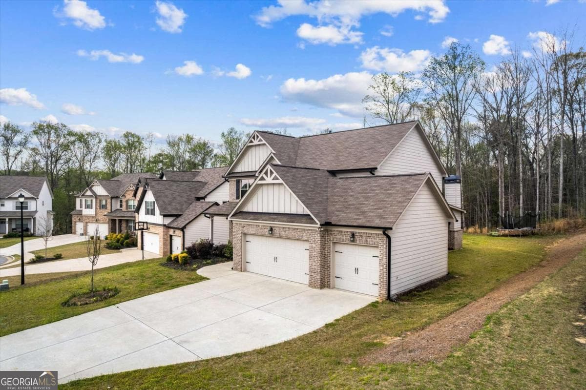 4 bedroom, 2.5 bathroom, 2,458 sq ft single family residence for sale at 3330 Elkhorn Ridge Run, Dacula, GA 30019 — photo 2
