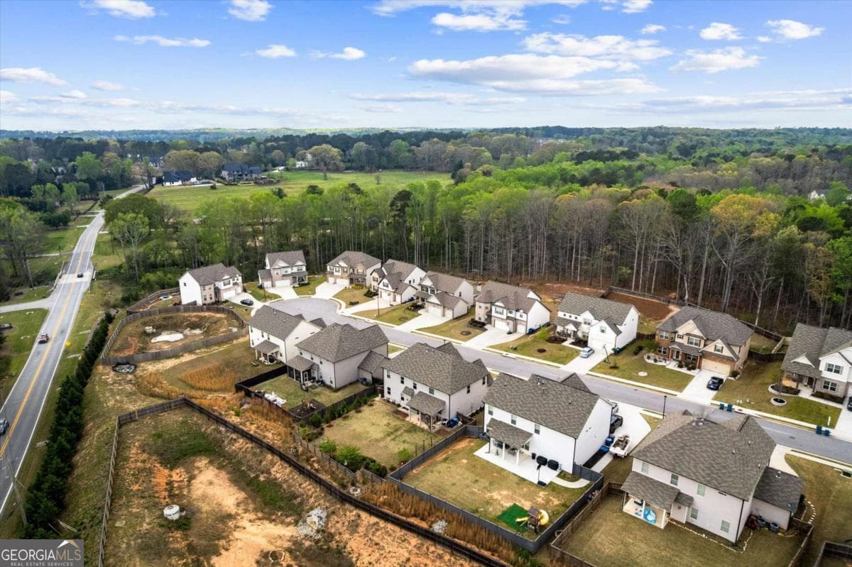 4 bedroom, 2.5 bathroom, 2,458 sq ft single family residence for sale at 3330 Elkhorn Ridge Run, Dacula, GA 30019 — photo 4