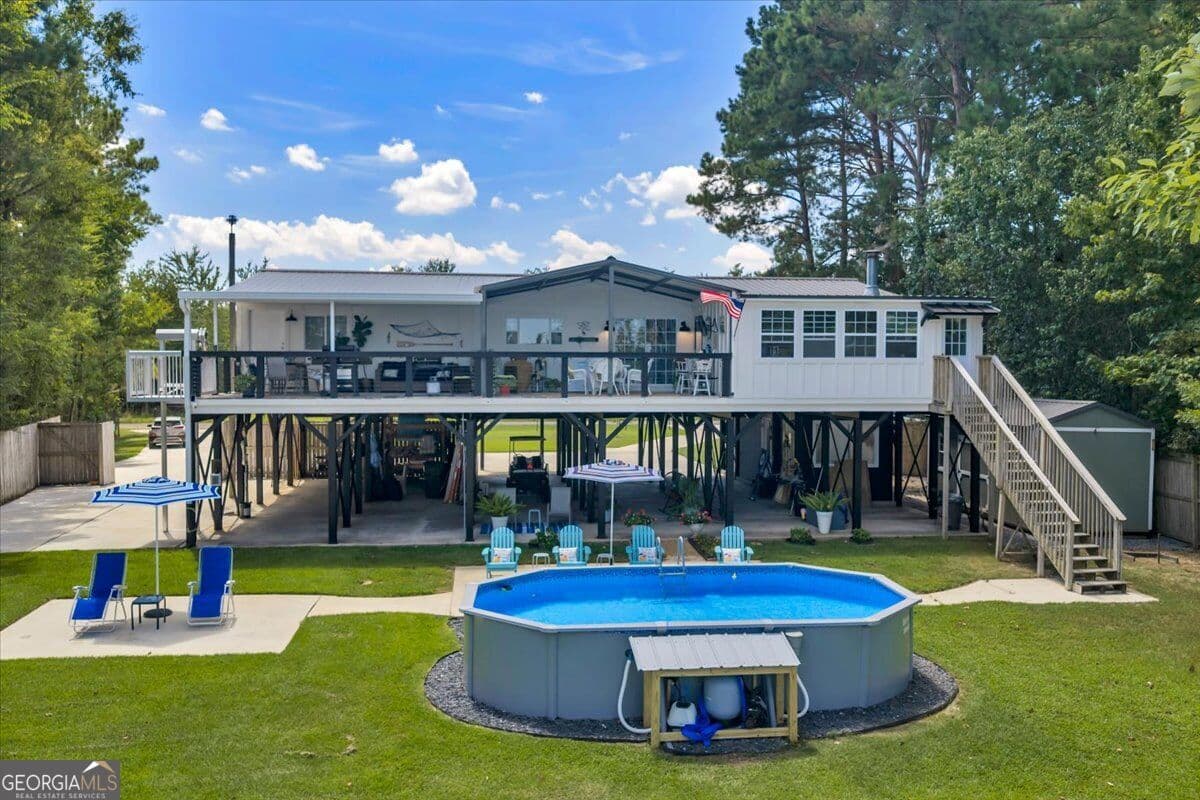 3 bedroom, 3 bathroom, 2,400 sq ft manufactured home,single family residence for sale at 121 W Entrekin Road, Cobb, GA 31735 — photo 2