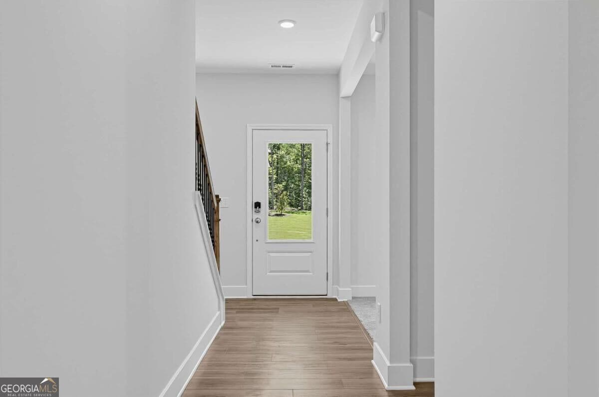 4 bedroom, 3.5 bathroom, 2,259 sq ft single family residence for sale at 3864 Breton Cove, Bethlehem, GA 30620 — photo 2