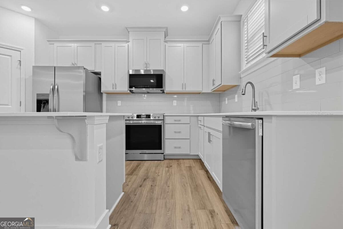 4 bedroom, 3.5 bathroom, 2,259 sq ft single family residence for sale at 3864 Breton Cove, Bethlehem, GA 30620 — photo 9