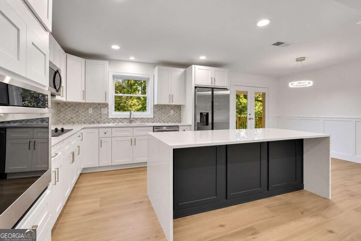 4 bedroom, 3.5 bathroom single family residence for sale at 1770 Austin Drive, Decatur, GA 30032 — photo 5