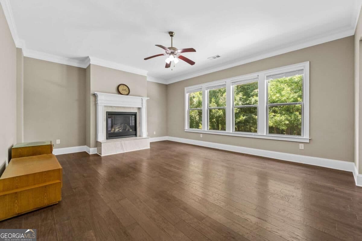 5 bedroom, 4 bathroom, 3,927 sq ft single family residence for sale at 3760 Kentwood Court, Suwanee, GA 30024 — photo 3