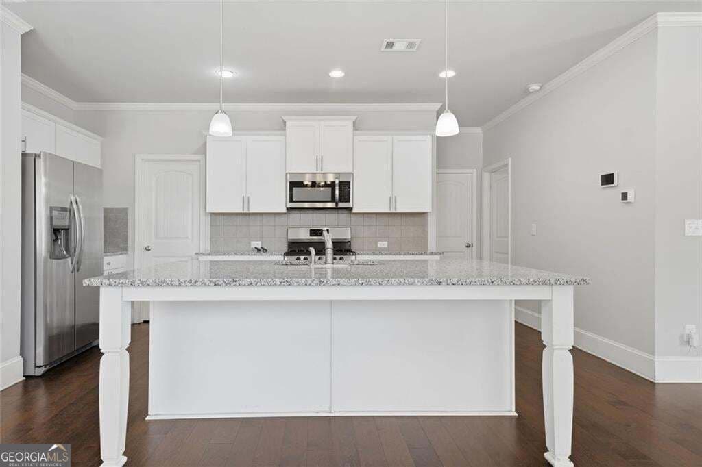 5 bedroom, 3 bathroom, 2,442 sq ft single family residence for sale at 4480 Huron Drive, Cumming, GA 30028 — photo 7
