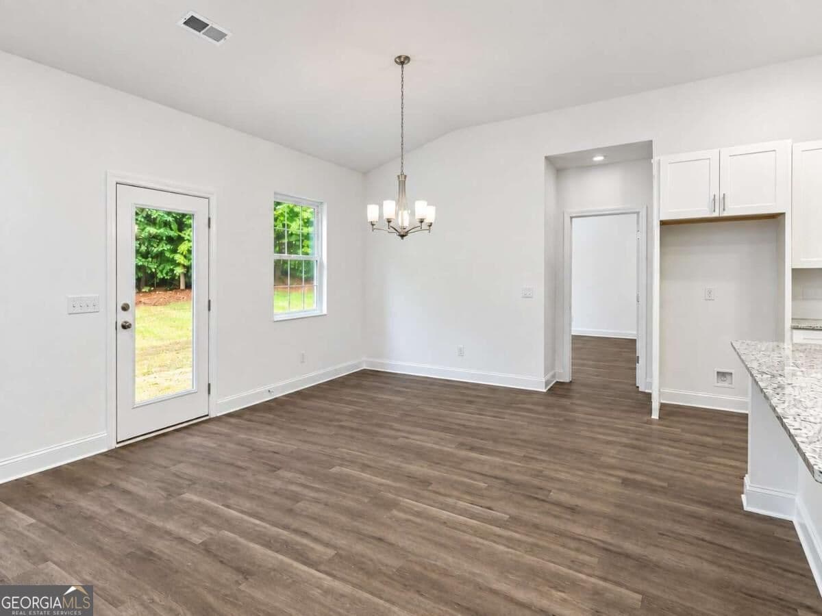 3 bedroom, 2 bathroom, 1,742 sq ft single family residence for sale at 1850 W Mcintosh Road, Griffin, GA 30223 — photo 5