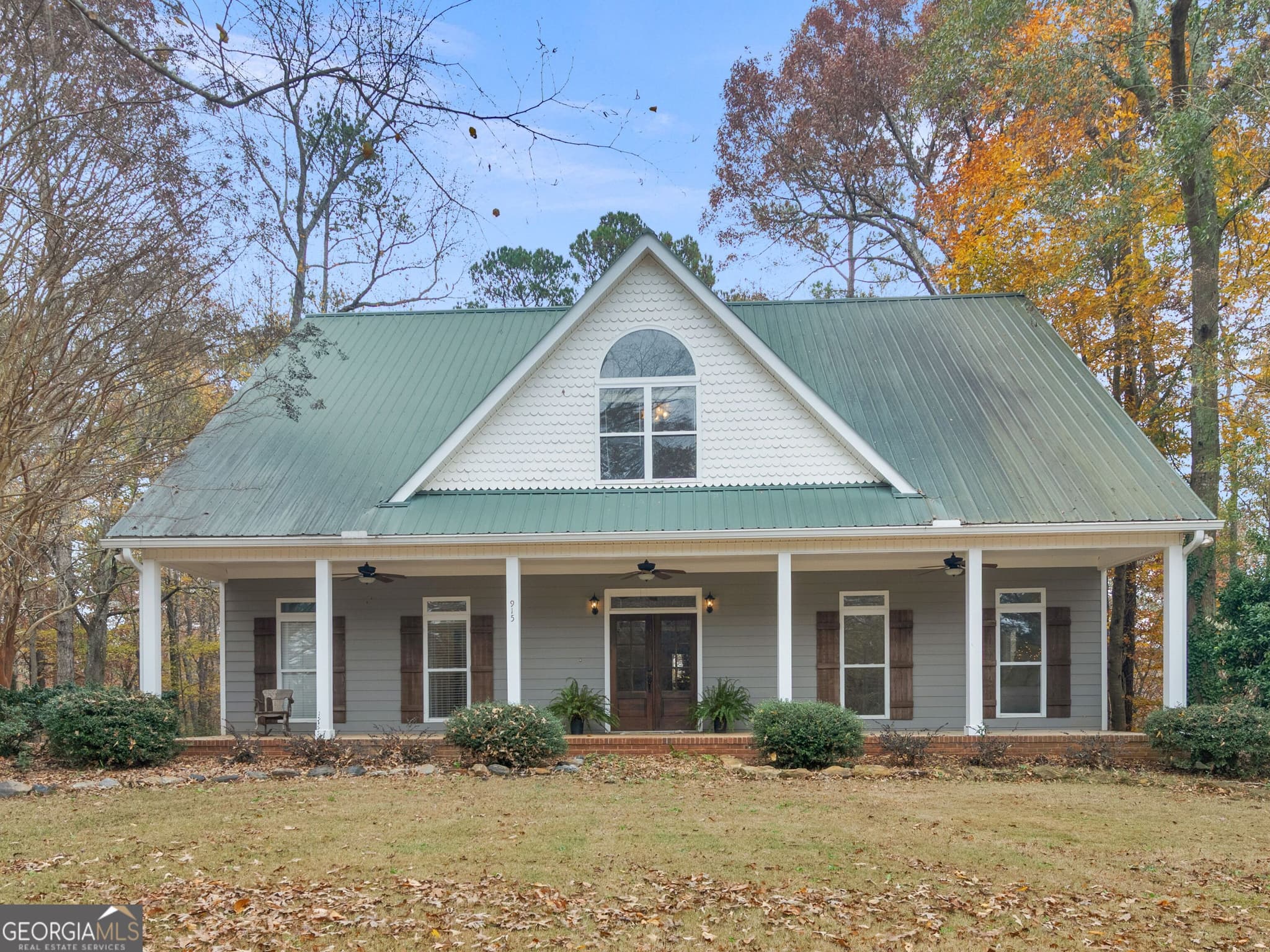 5 bedroom, 2.5 bathroom, 4,392 sq ft single family residence for sale at 915 Rocky Creek Road, Hampton, GA 30228 — photo 1 of 77