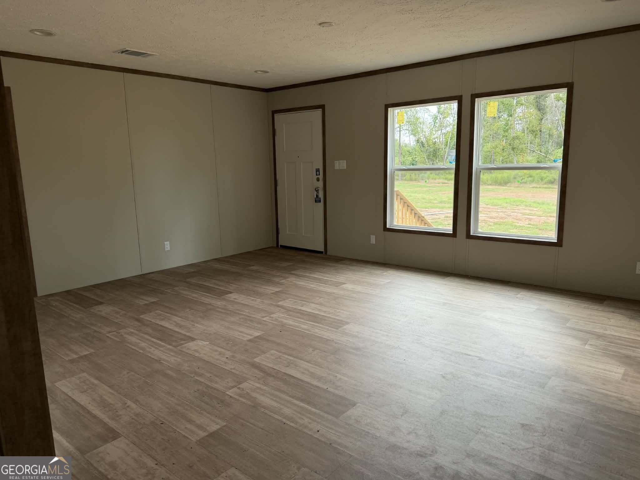 3 bedroom, 2 bathroom, 1,800 sq ft manufactured home,single family residence for sale at 1509 E 4th St Ext, Alma, GA 31510 — photo 2