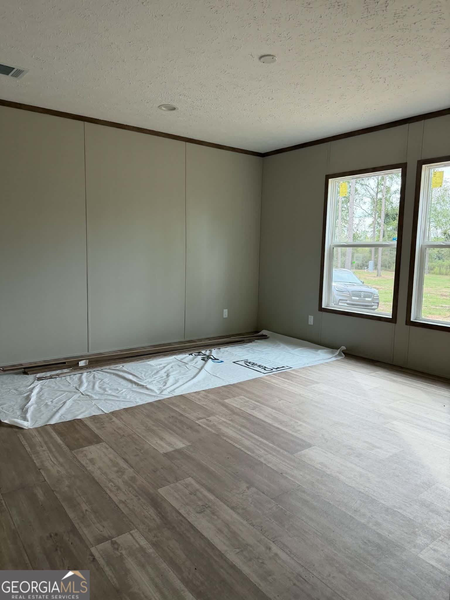 3 bedroom, 2 bathroom, 1,800 sq ft manufactured home,single family residence for sale at 1509 E 4th St Ext, Alma, GA 31510 — photo 6