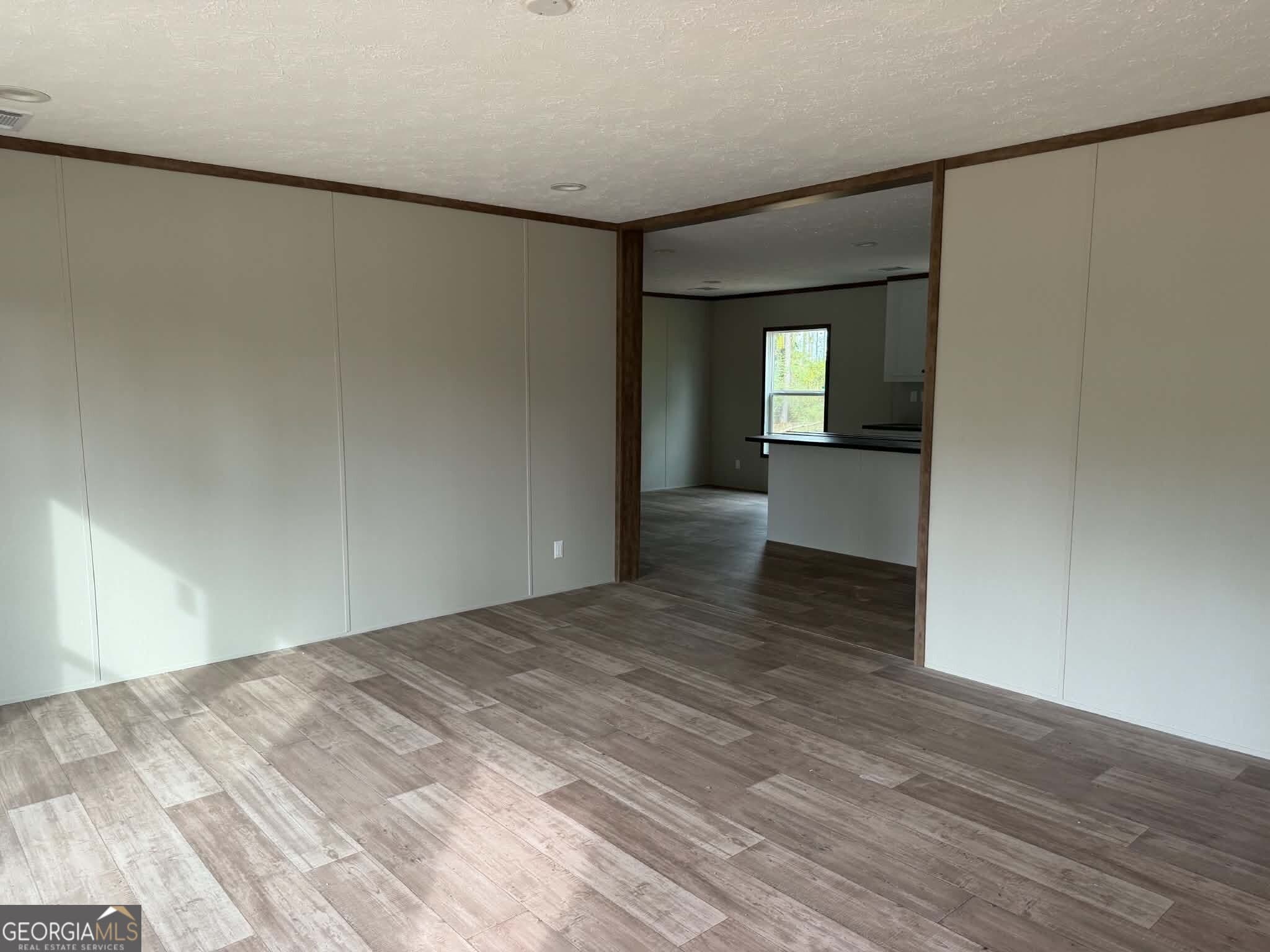 3 bedroom, 2 bathroom, 1,800 sq ft manufactured home,single family residence for sale at 1509 E 4th St Ext, Alma, GA 31510 — photo 3