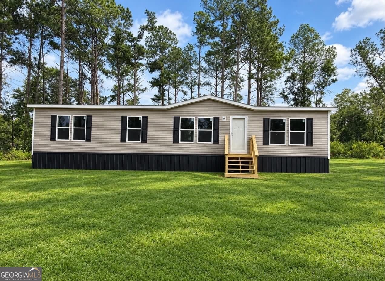 3 bedroom, 2 bathroom, 1,800 sq ft manufactured home,single family residence for sale at 1509 E 4th St Ext, Alma, GA 31510