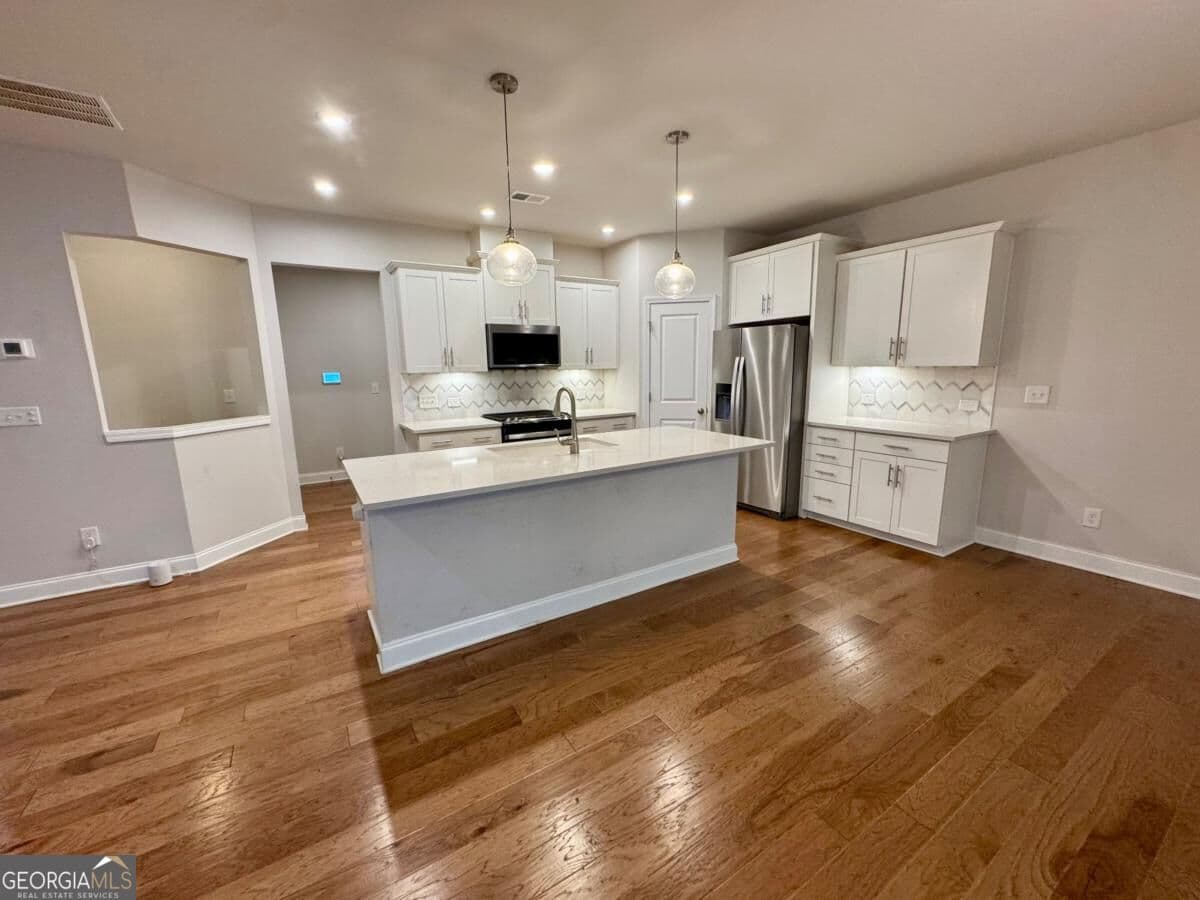 4 bedroom, 2.5 bathroom, 3,048 sq ft single family residence for sale at 72 Riverclub Road, Acworth, GA 30101 — photo 4