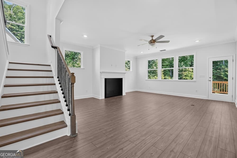 5 bedroom, 4.5 bathroom single family residence for sale at 8935 Avonbrook Close, Ball Ground, GA 30107 — photo 9