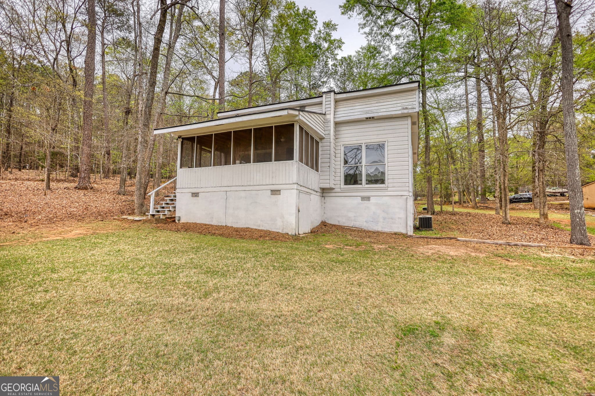 2 bedroom, 1 bathroom, 1,050 sq ft single family residence for sale at 1697 County Line Extension, Mansfield, GA 30055 — photo 2
