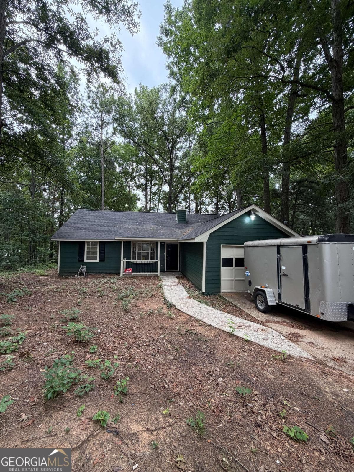 3 bedroom, 2 bathroom, 1,176 sq ft single family residence for sale at 1094 Crystal Lake Road, Atlanta, GA 30349 — photo 1 of 14