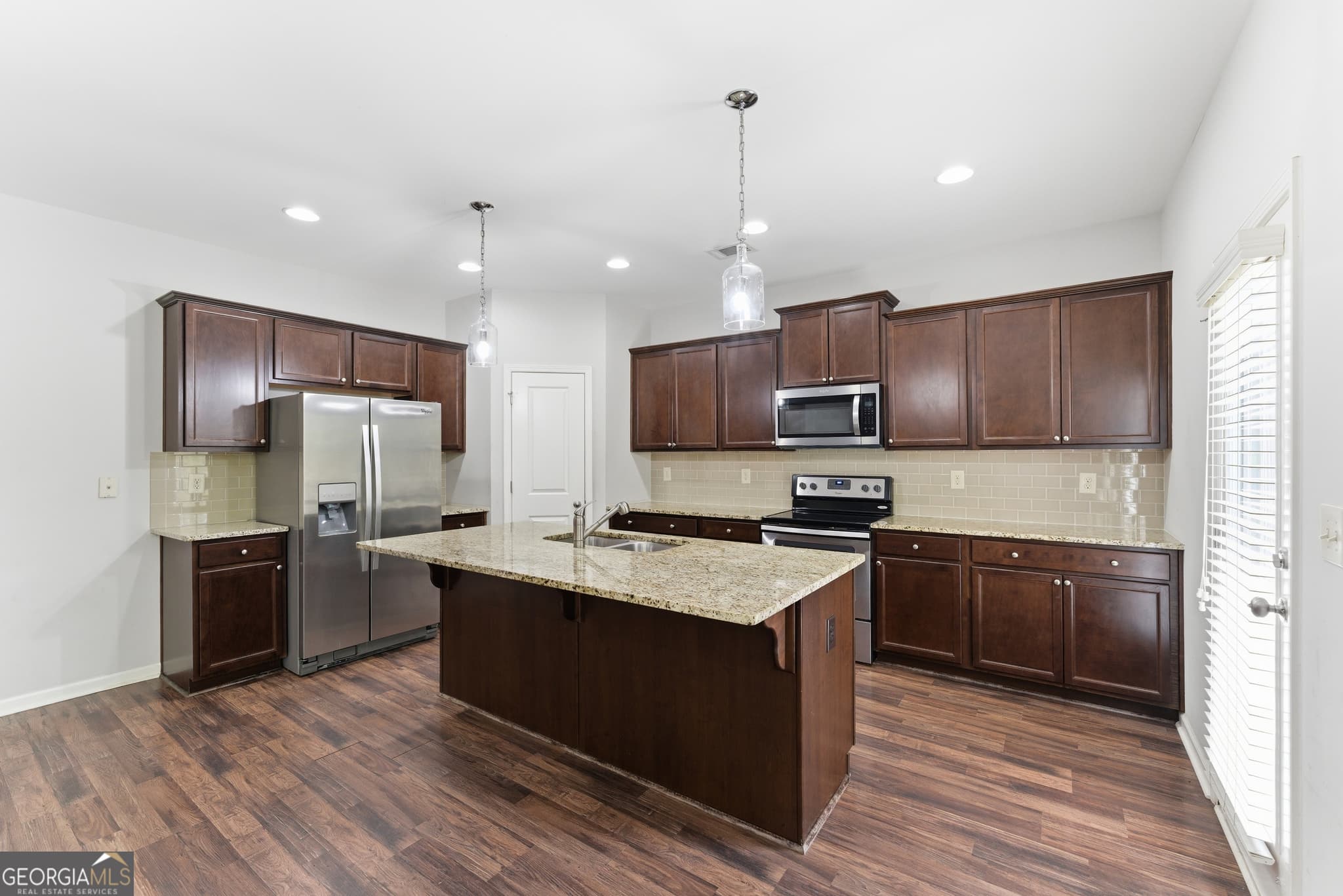 4 bedroom, 2.5 bathroom, 2,651 sq ft single family residence for sale at 5942 Watersdown Way, Flowery Branch, GA 30542 — photo 7