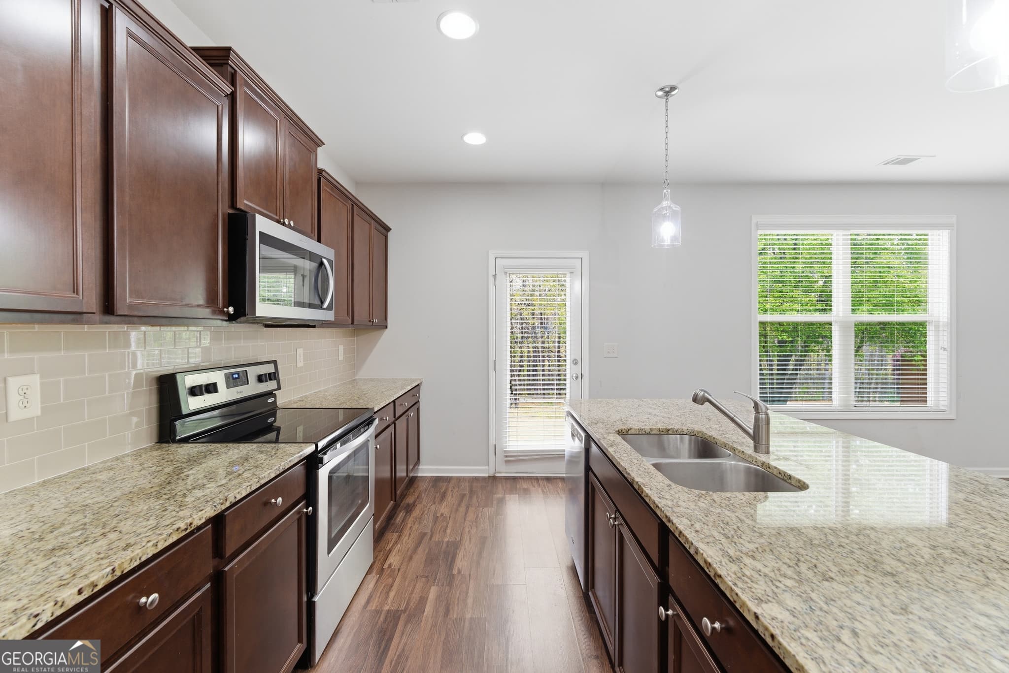 4 bedroom, 2.5 bathroom, 2,651 sq ft single family residence for sale at 5942 Watersdown Way, Flowery Branch, GA 30542 — photo 8