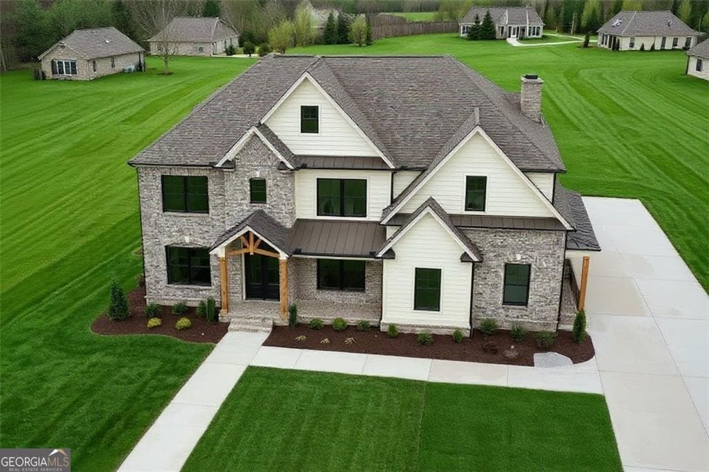 6 bedroom, 6.5 bathroom, 5,895 sq ft single family residence for sale at 2875 N Bogan, Buford, GA 30519 — photo 2