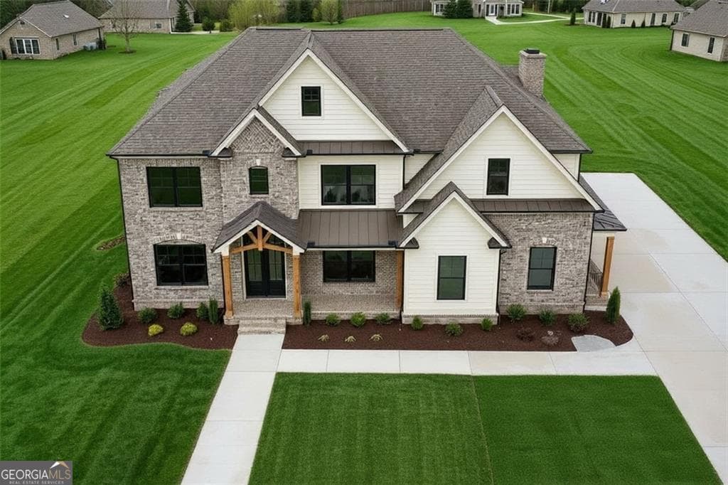 6 bedroom, 6.5 bathroom, 5,895 sq ft single family residence for sale at 2875 N Bogan, Buford, GA 30519 — photo 3