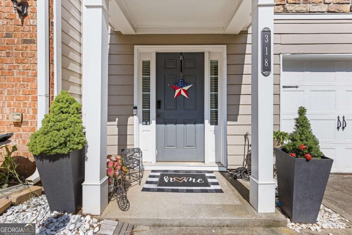 3 bedroom, 3 bathroom, 1,784 sq ft townhouse for sale at 2928 George Busbee Parkway 318, Kennesaw, GA 30144 — photo 2