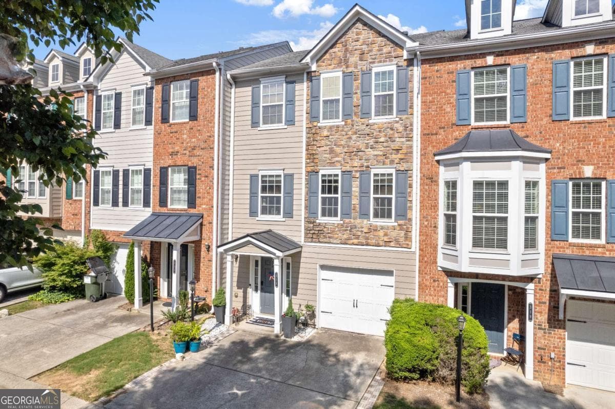 3 bedroom, 3 bathroom, 1,784 sq ft townhouse for sale at 2928 George Busbee Parkway 318, Kennesaw, GA 30144