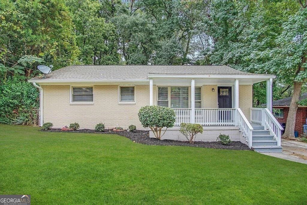 3 bedroom, 1 bathroom, 1,040 sq ft single family residence for sale at 2228 SW Springdale Circle, Atlanta, GA 30315 — photo 1 of 15
