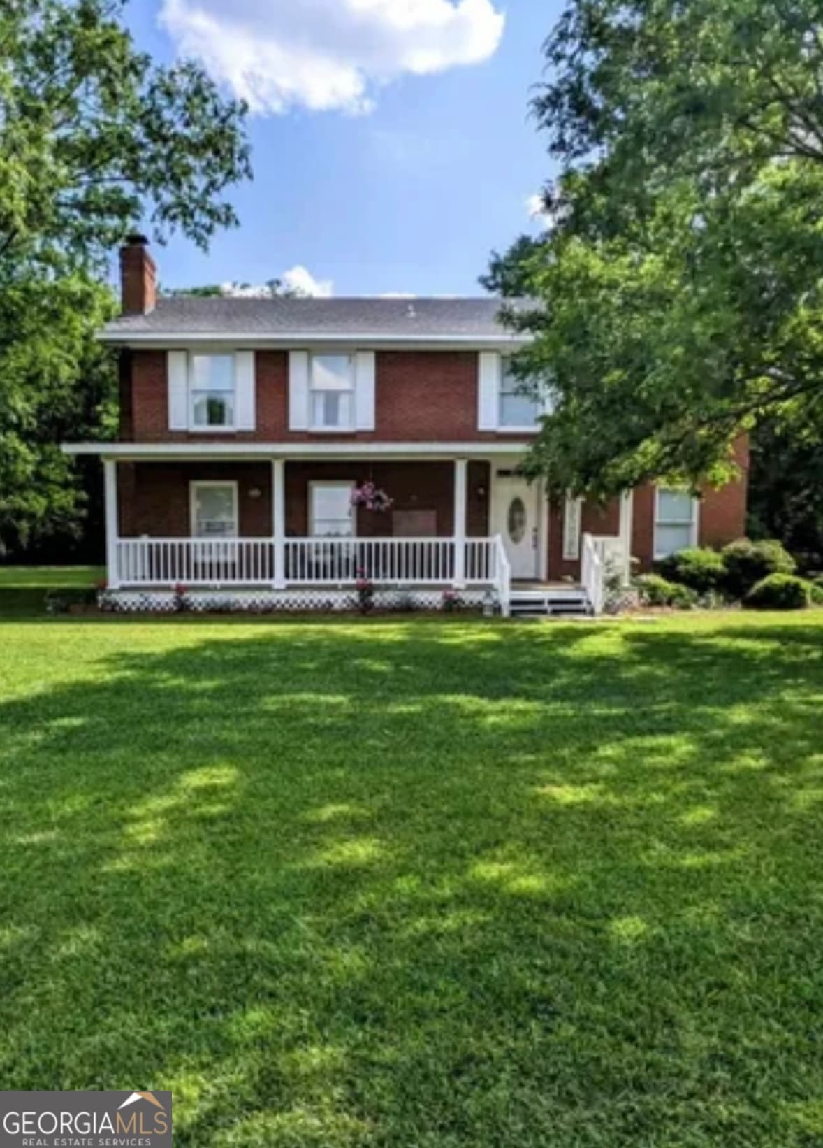 4 bedroom, 2.5 bathroom, 2,392 sq ft single family residence for sale at 164 W Myra Street, Alma, GA 31510 — photo 2