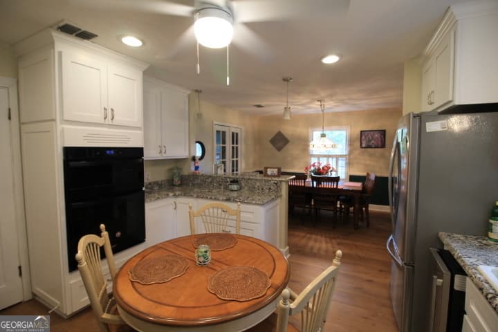 4 bedroom, 2.5 bathroom, 2,392 sq ft single family residence for sale at 164 W Myra Street, Alma, GA 31510 — photo 7