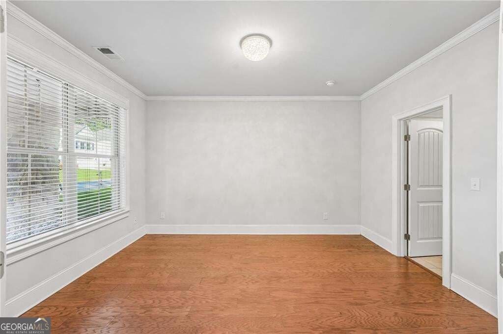 5 bedroom, 4 bathroom, 4,261 sq ft single family residence for sale at 3795 Gardenside Court, Alpharetta, GA 30004 — photo 7