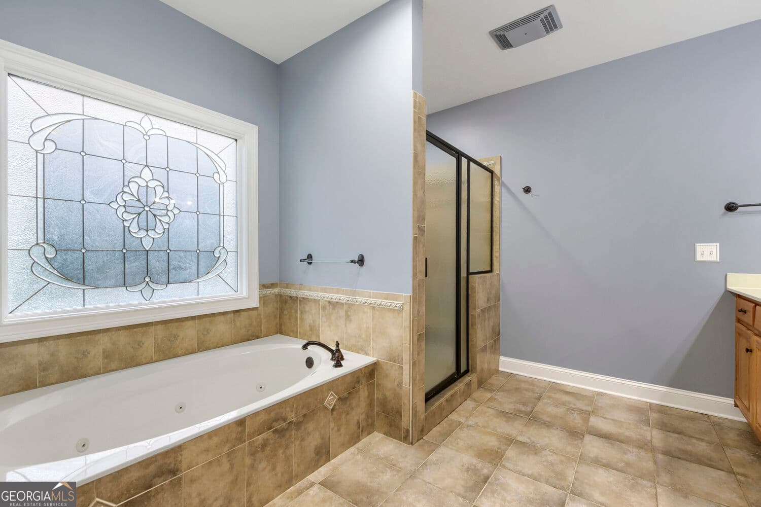 6 bedroom, 4.5 bathroom, 6,340 sq ft single family residence for sale at 615 Kristen Court, Mcdonough, GA 30252 — photo 9