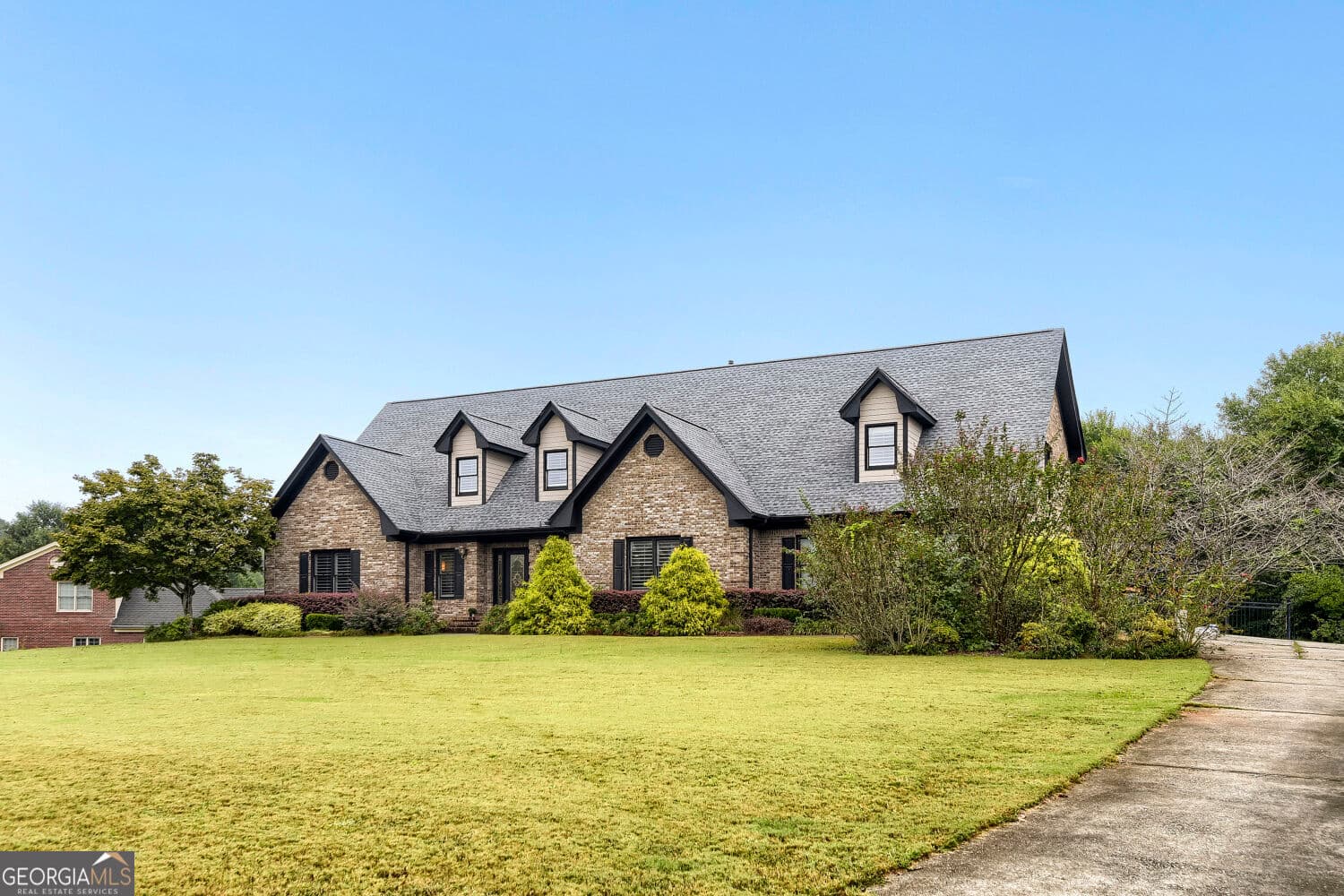 6 bedroom, 4.5 bathroom, 6,340 sq ft single family residence for sale at 615 Kristen Court, Mcdonough, GA 30252 — photo 4