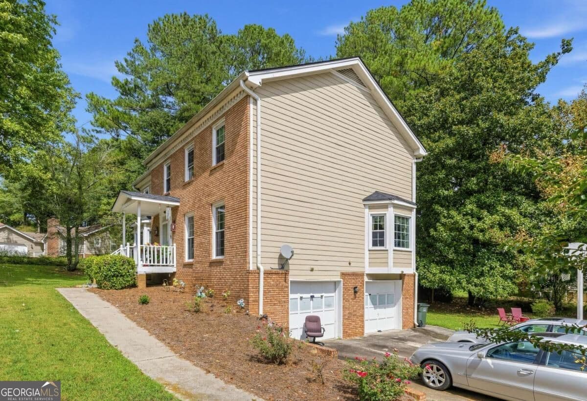4 bedroom, 2.5 bathroom, 3,517 sq ft single family residence for sale at 3012 Overwood Lane, Snellville, GA 30078 — photo 2