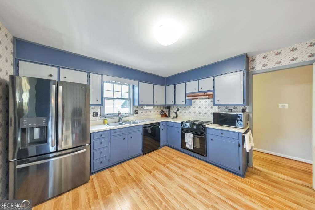 4 bedroom, 3 bathroom, 2,058 sq ft single family residence for sale at 1648 Lancaster Drive, Marietta, GA 30066 — photo 3